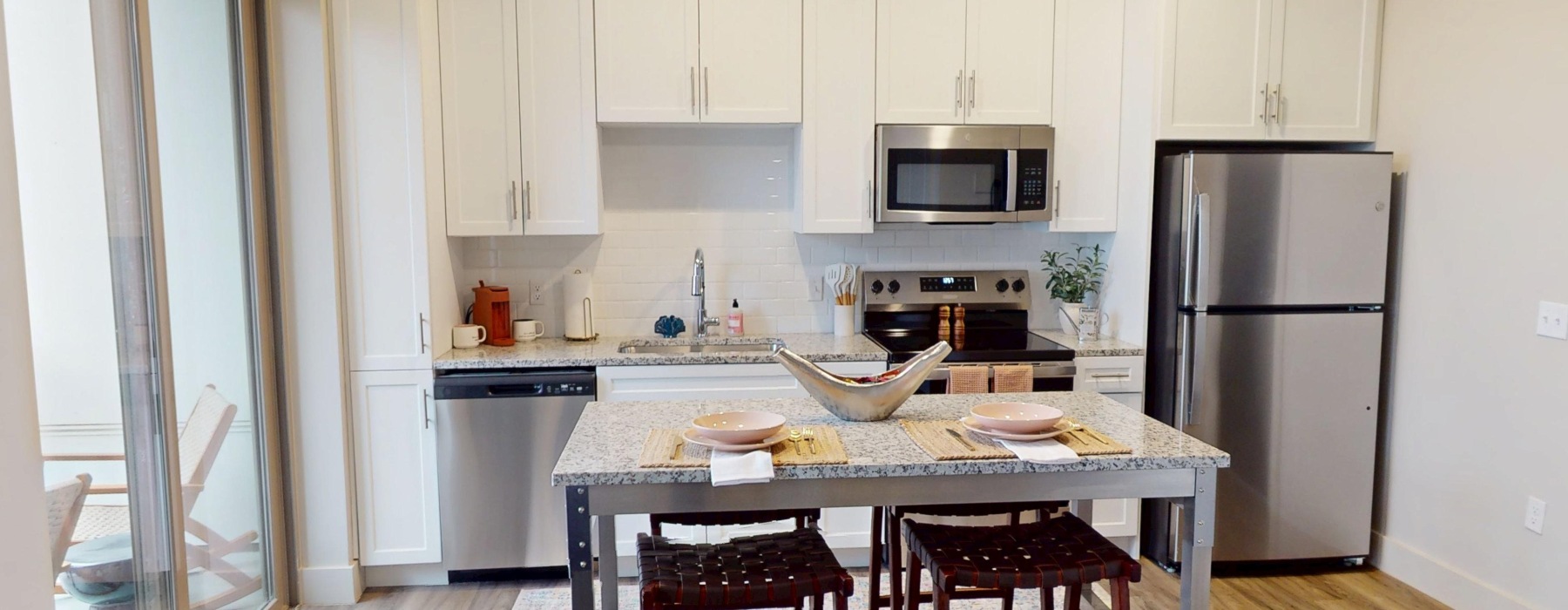 a kitchen with stainless steel appliances
