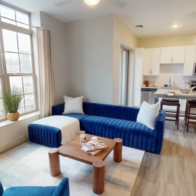 a living room with a couch and a coffee table